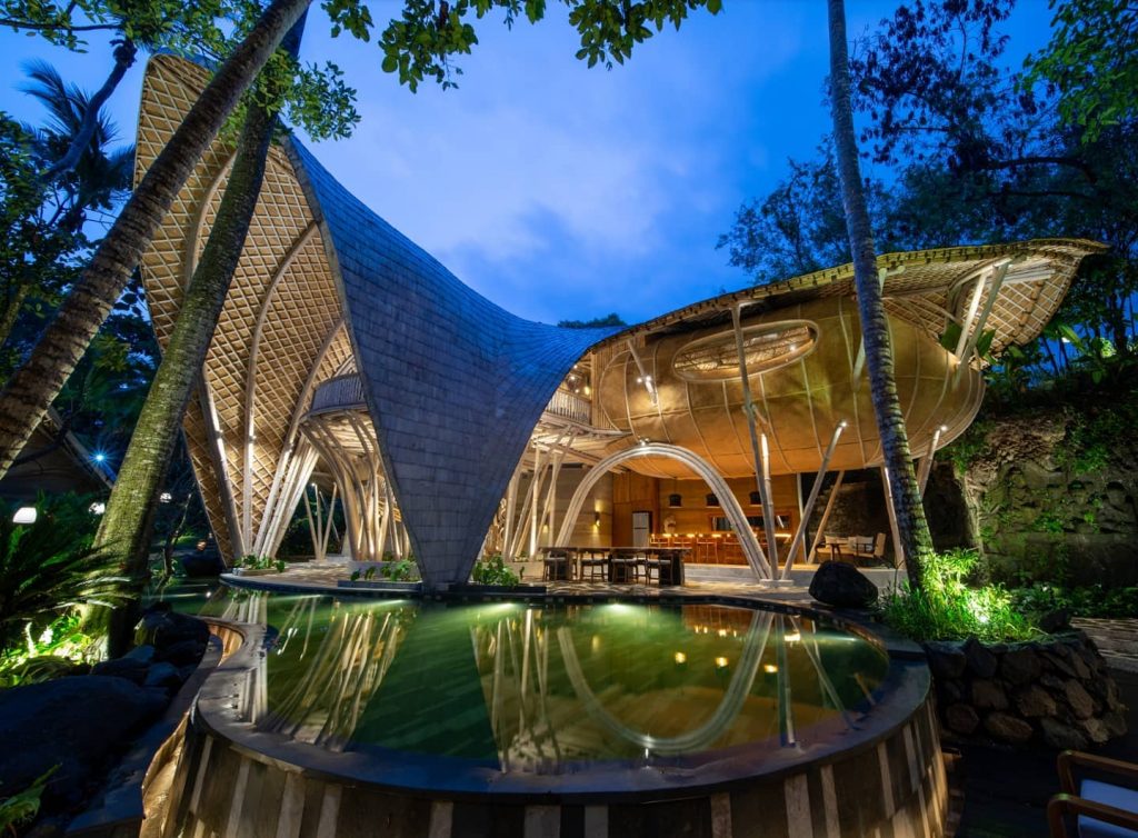 Night pool view of a Bamboo resort - Ulaman Eco Retreat Bali