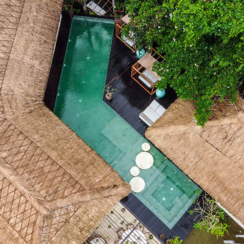 Bamboo and thatch roof villa bird view